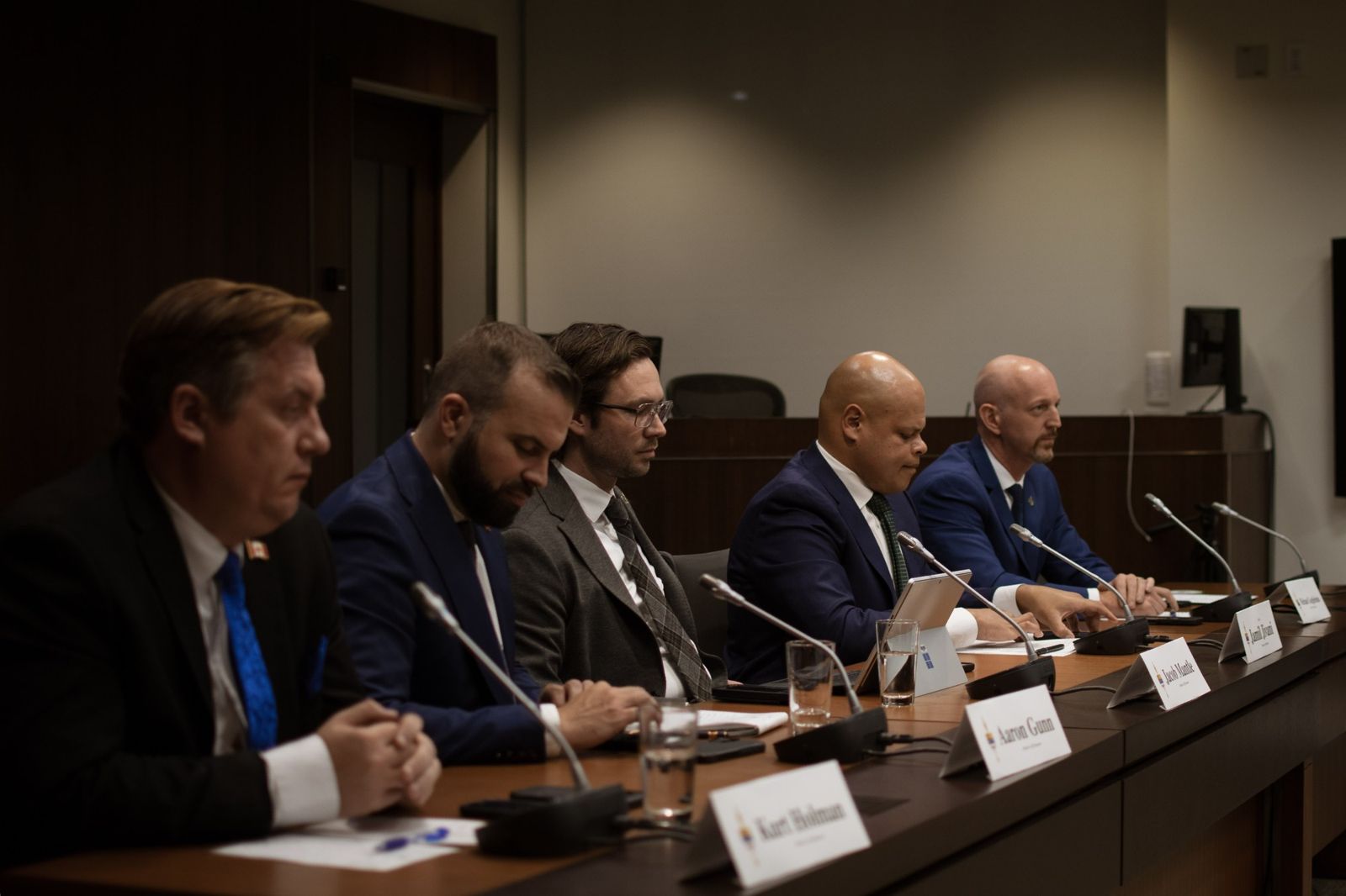 MPs Kurt Holman, Aaron Gunn, Jacob Mantle, Jamil Jivani and Michael Guglielmin listen to testimony