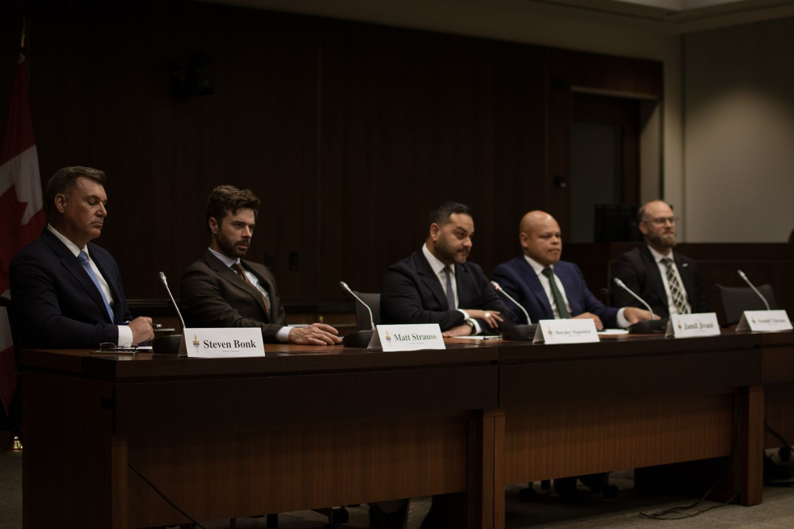 MPs Steven Bonk, Matt Strauss, Shuvaloy Majumdar and Jamil Jivani at the Task Force table